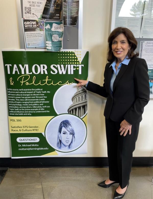Gov. Kathy Hochul points at a "Taylor Swift & Politics" poster in an undated photo. (Office of the Governor)